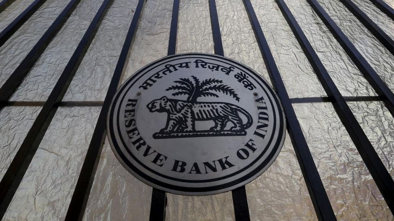 The Reserve Bank of India (RBI) seal is pictured on a gate outside the RBI headquarters in Mumbai. Credit: Reuters File Photo