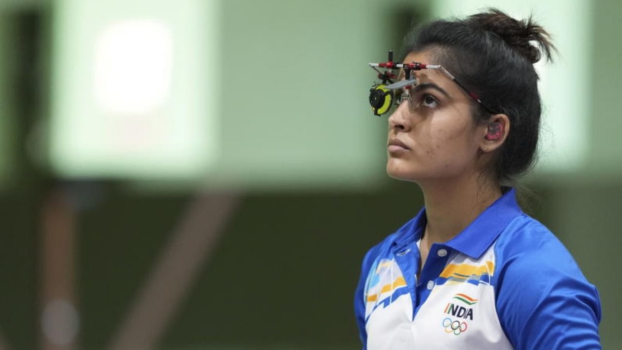 India's Manu Bhaker reacts during the 10m Air Pistol Women's Qualification at the Summer Olympics 2020, in Tokyo, Sunday, July 25, 2021. Bhaker failed to qualify for the finals. Credit: PTI Photo
