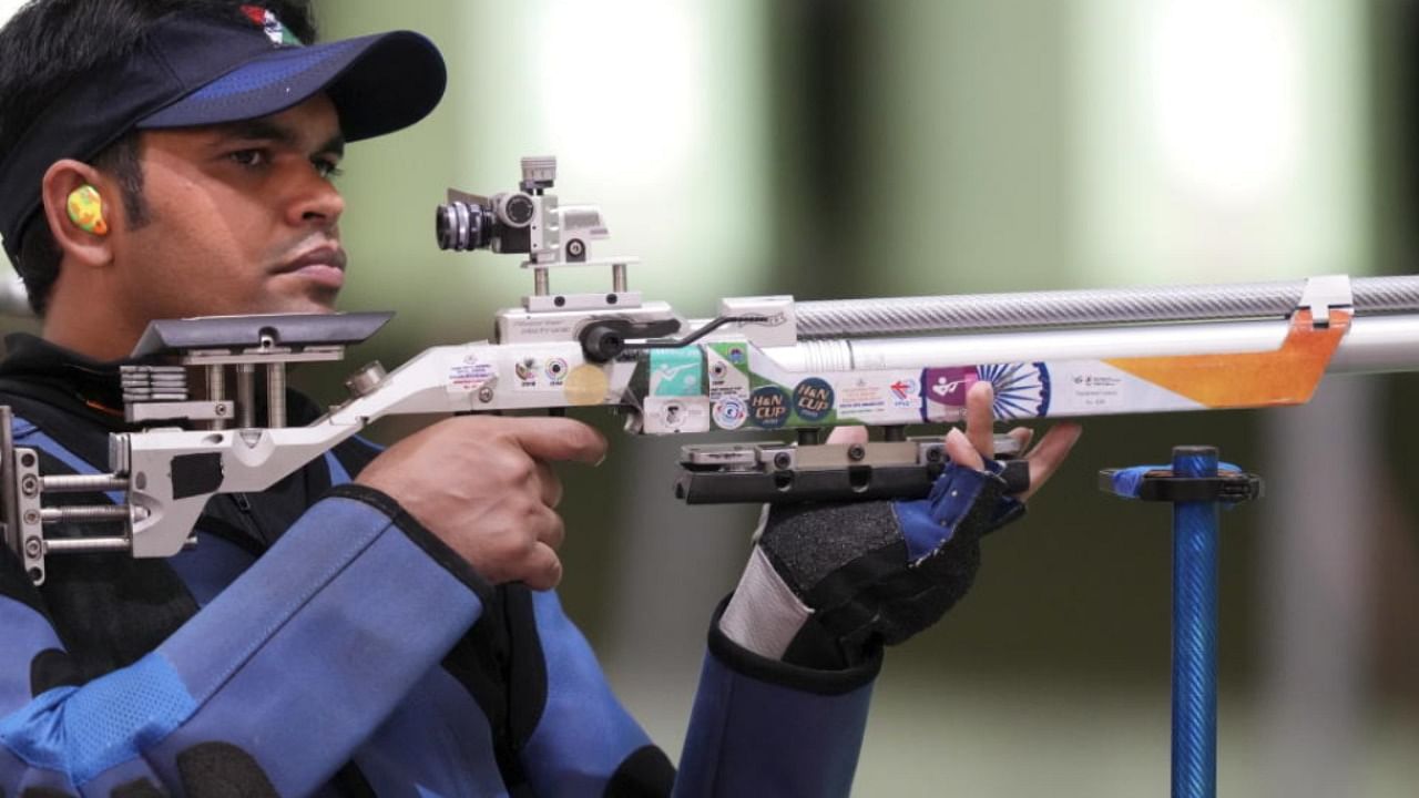Deepak Kumar in action during the 10m Air Pistol Men's Qualification event at the Summer Olympics 2020. Credit: PTI Photo