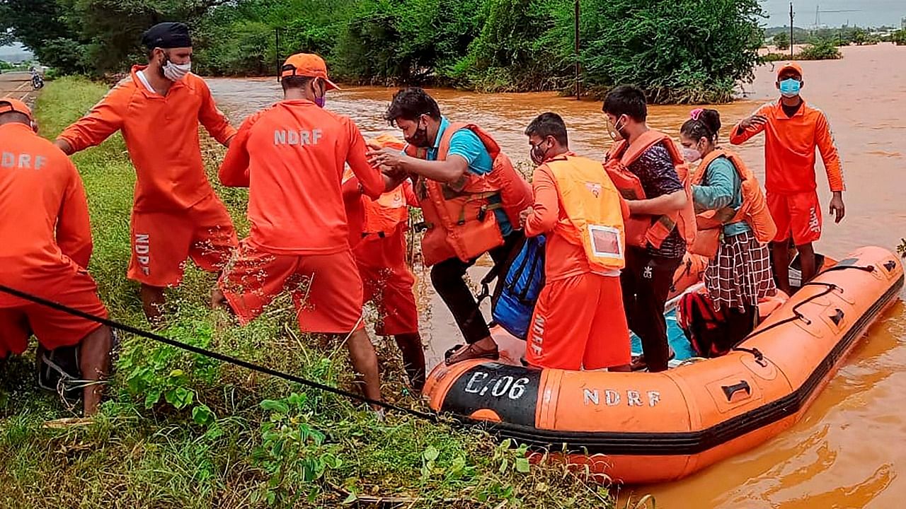 NDRF team during a rescue operation at a fooded area after rain in Kolhapur. Credit: PTI photo