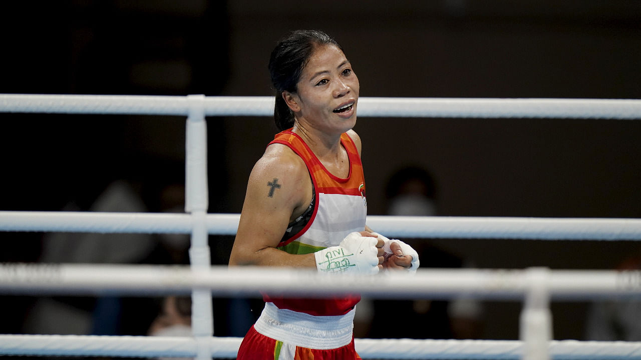 Indian boxer Mary Kom in action with Miguelina Hernandez Garcia of the Dominican Republic. Credit: PTI Photo