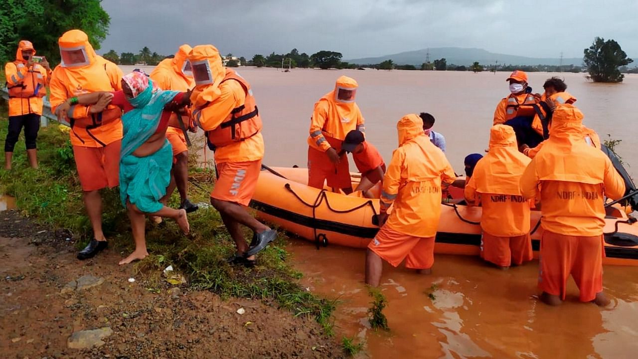 NDRF team during a rescue operation at a flooded area after rain in Kolhapur. Credit: PTI Photo