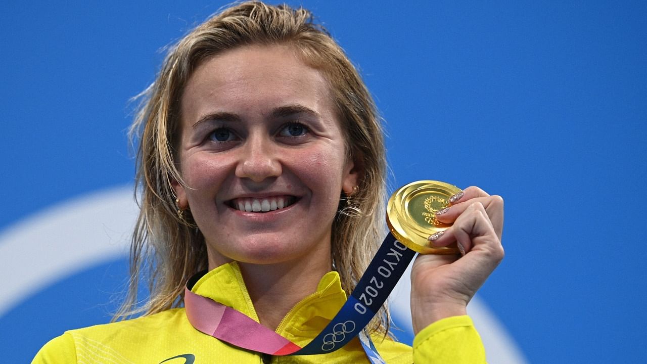 Gold medallist Australia's Ariarne Titmus poses with their medal after the final of the women's 400m freestyle swimming event during the Tokyo 2020 Olympic Games at the Tokyo Aquatics Centre in Tokyo on July 26, 2021. Credit: AFP Photo