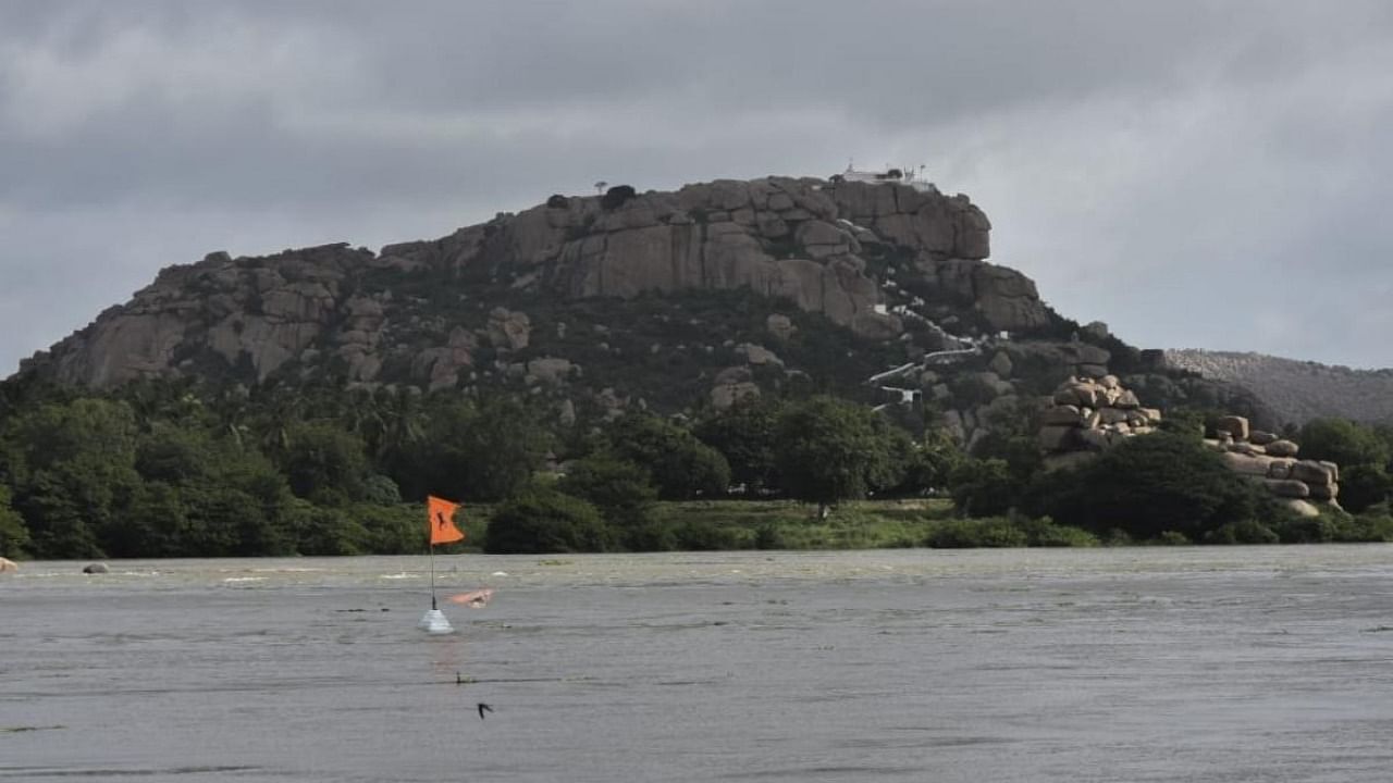 Several monuments, including Purandara Mantapa (in pic) in Unesco world heritage site Hampi have gone under the floodwaters following heavy discharge from Tungabhadra dam. Credit: DH photo