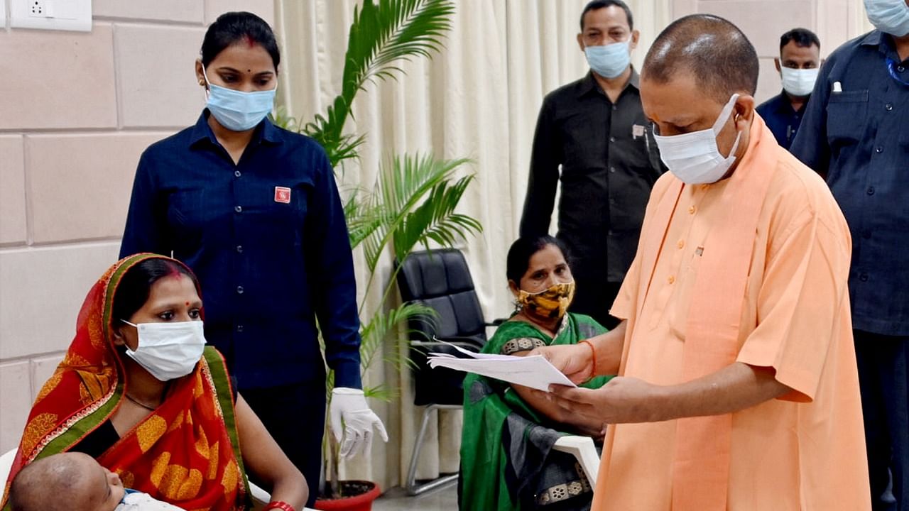 UP Chief Minister Yogi Adityanath during 'Janta Darshan' organised at his official residence in Lucknow. Credit: PTI Photo