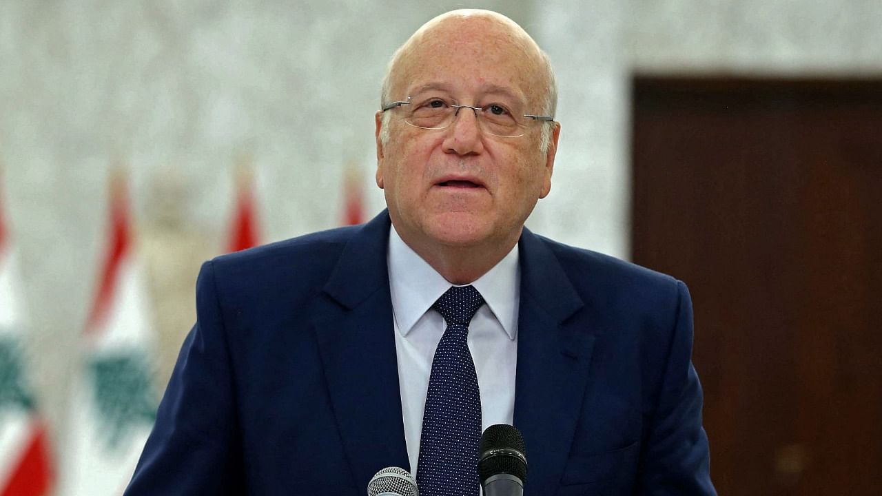 A handout picture provided by the Lebanese photo agency Dalati and Nohra shows Lebanon's two-time premier Najib Mikati holds a press conference following his meeting with the president at the presidential palace in Baabda, east of the capital Beirut on July 26, 2021. Credit: AFP Photo