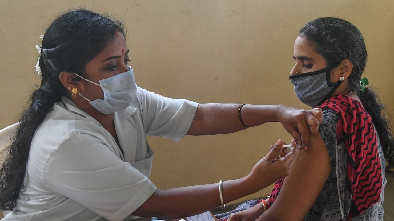 The government had stated in May that it would make 516 million (51.6 crore) vaccine shots available by the end of this month. Credit: DH Photo/S K Dinesh