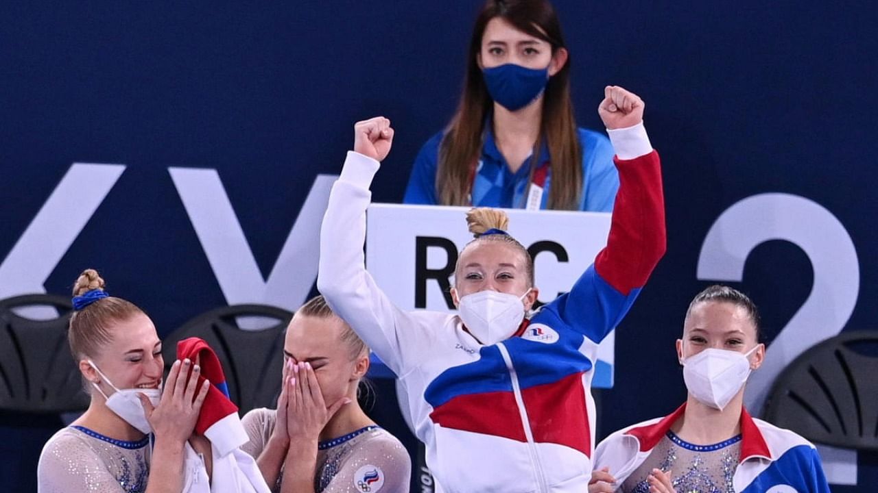 Angelina Melnikova of the Russian Olympic Committee, Vladislava Urazova of the Russian Olympic Committee, Liliia Akhaimova of the Russian Olympic Committee and Viktoriia Listunova of the Russian Olympic Committee celebrate after winning gold. Credit: Reuters Photo