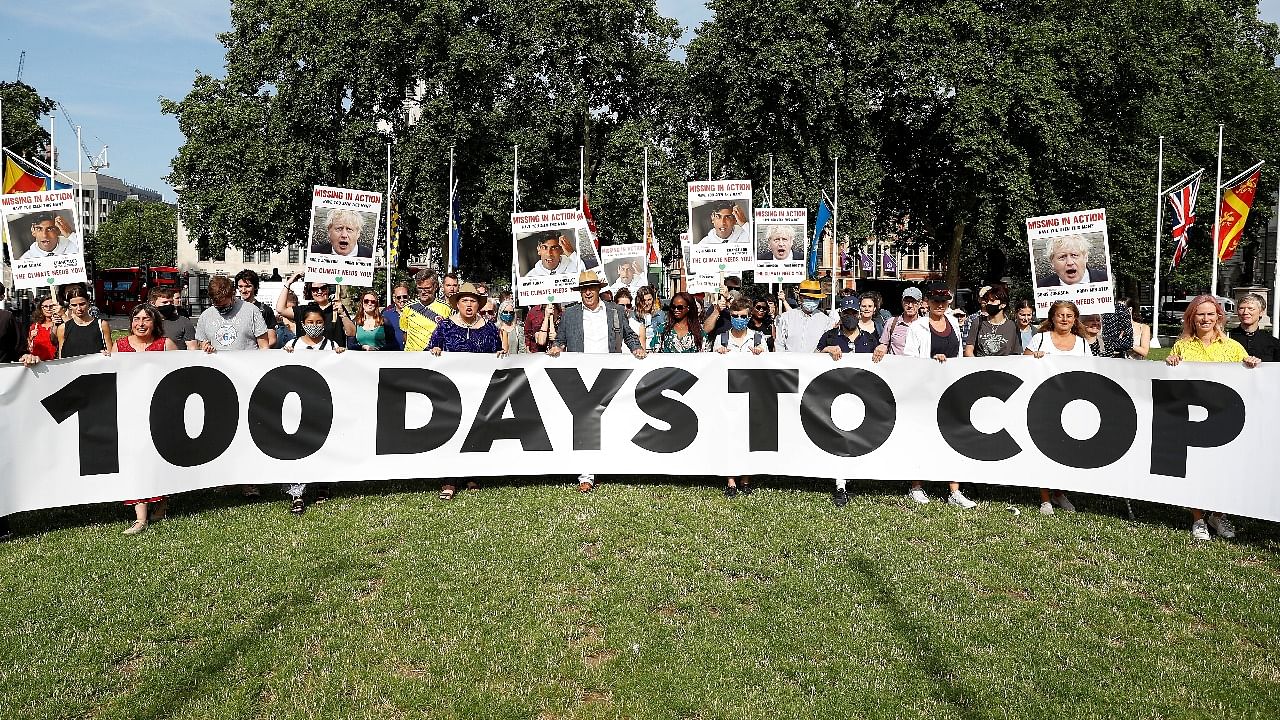 Climate Coalition protesters demonstrate 100 days ahead of the COP26 climate summit, in London. Credit: Reuters photo
