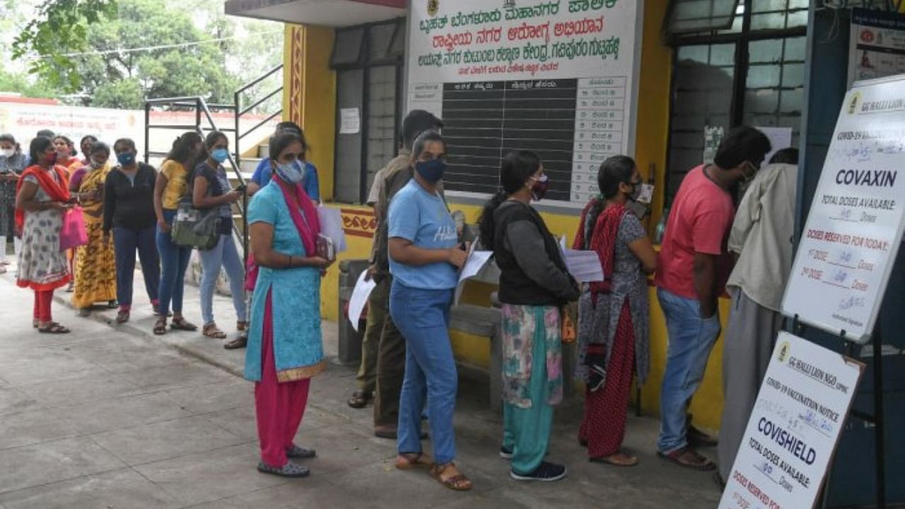 People queue up for Covid vaccine in Bengaluru. Credit: DH File Photo/S K Dinesh