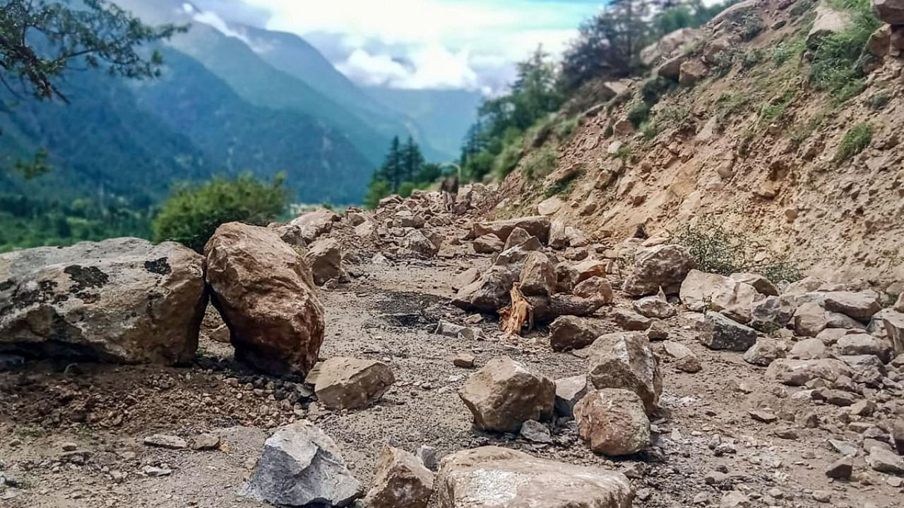 A road blocked after a landslide at Batseri of Sangla valley in Kinnaur district. Credit: PTI Photo