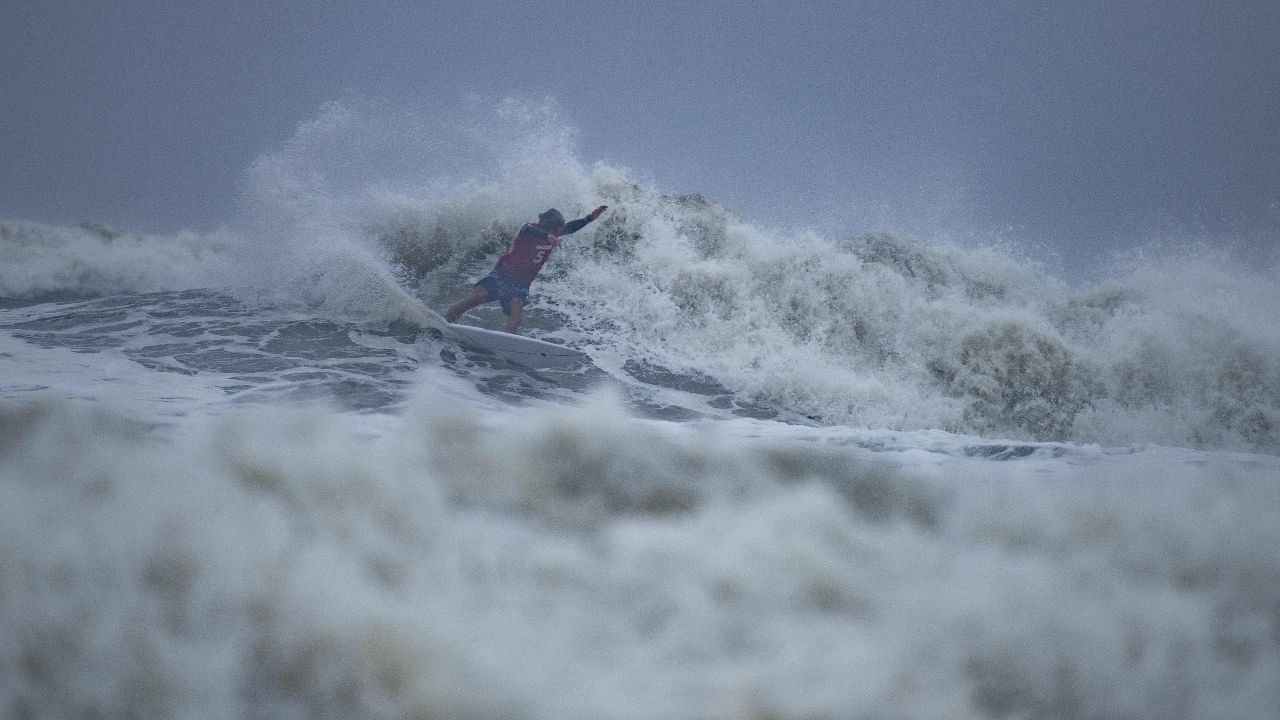 Japan's Kanoa Igarashi rides a wave during the men's Surfing 1/4 finals at the Tsurigasaki Surfing Beach. Credit: AFP Photo