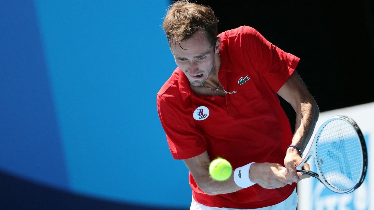 Daniil Medvedev returns the ball to Italy's Fabio Fognini at Tokyo 2020. Credit: AFP