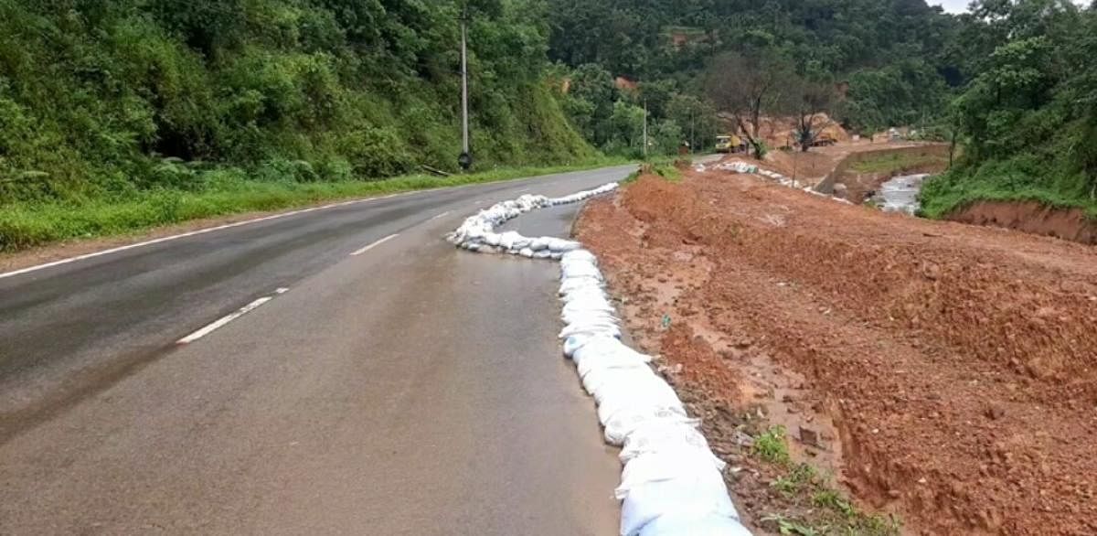 Sandbags have been placed to protect the highway in Kodagu district. Credit: special arrangement
