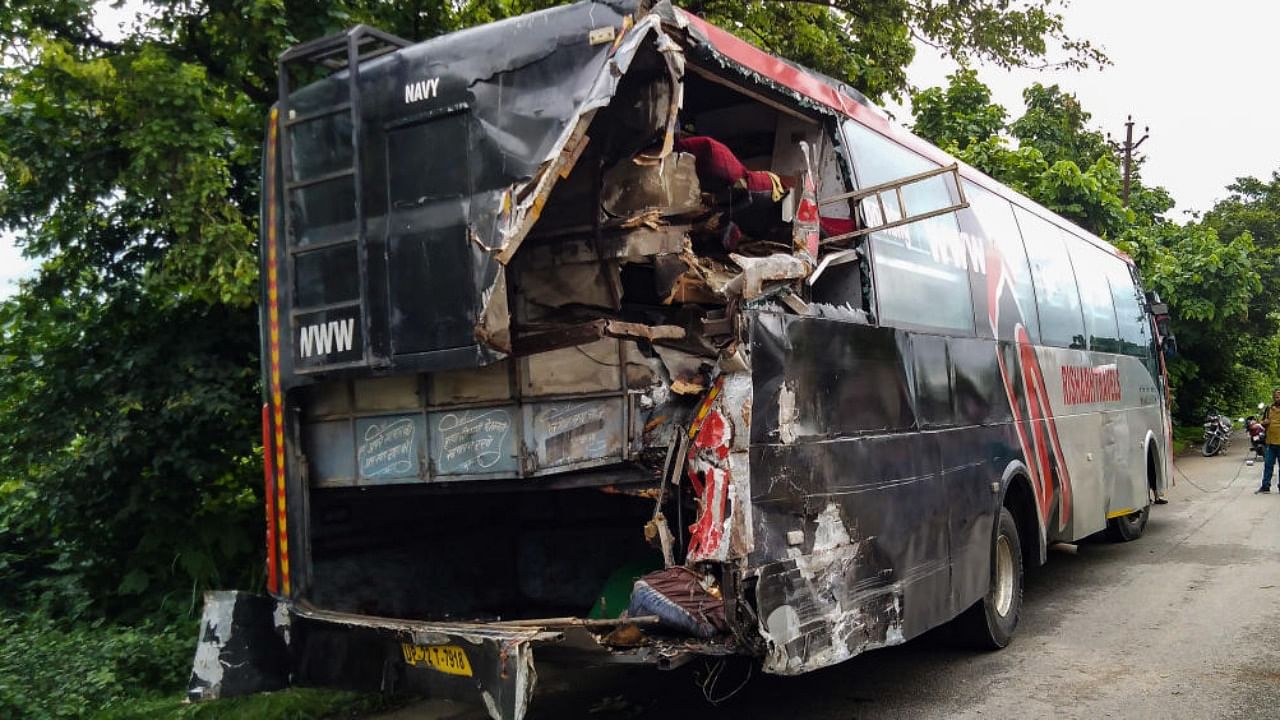 The double decker private bus which was hit by speeding truck at the accident site on Lucknow-Ayodhya road, in Barabanki, Wednesday, July 28, 2021. Credit: PTI Photo