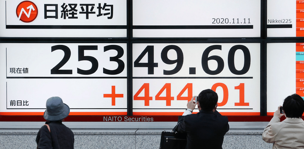 Japan's Nikkei slid 1.15 per cent to a six-month low, with shares in SoftBank Group, a major investor in Chinese tech, falling 3.68 per cent. Credit: AFP Photo