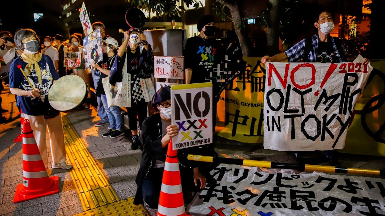 Anti-Olympic protesters flock in front of Japanese Prime Minister Yoshihide Suga's office to call for Tokyo 2020 Olympic Games cancellation. Credit: Reuters Photo
