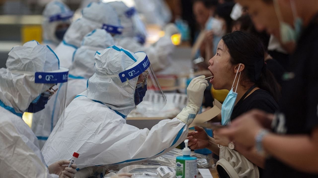 Many of the people infected in China, including the Nanjing airport workers, had been fully vaccinated. Credit: Bloomberg Photo