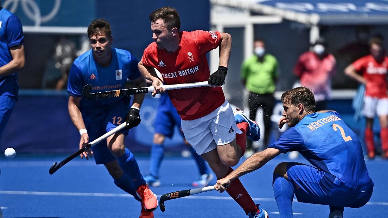 Netherlands led Britain 2-0 when the game went into the final quarter but gave up their lead after their opponents stepped up the pressure. Credit: AFP Photo
