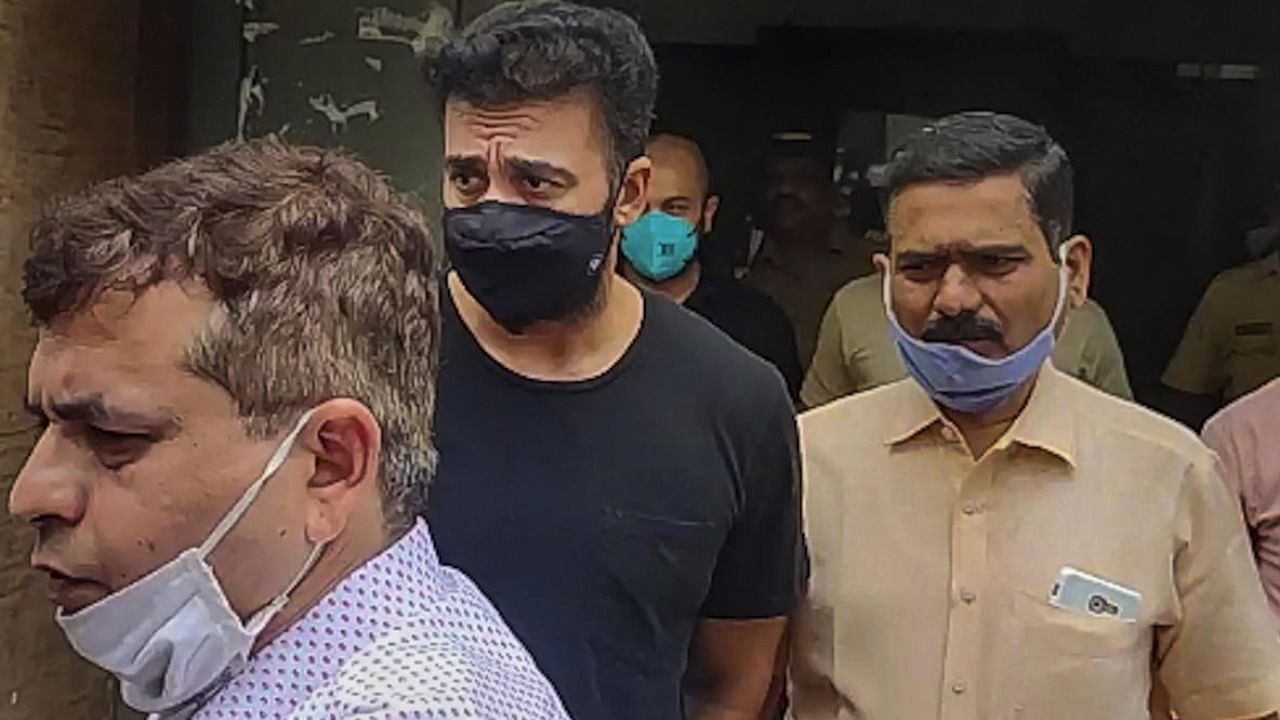 Raj Kundra being taken to Killa Court from Property Cell Unit office in a pornography-related case, at Byculla in Mumbai. Credit: PTI Photo