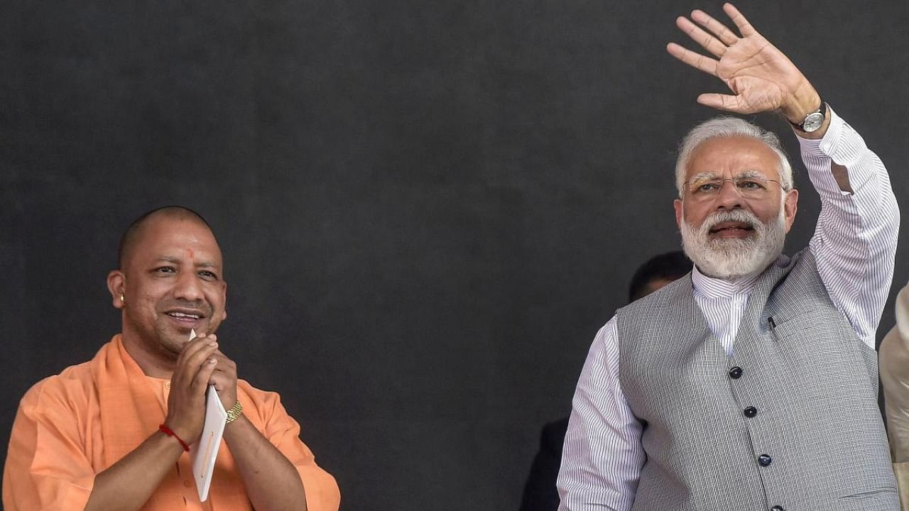 Prime Minister Narendra Modi and Uttar Pradesh Chief Minister Yogi Adityanath. Credit: PTI File Photo