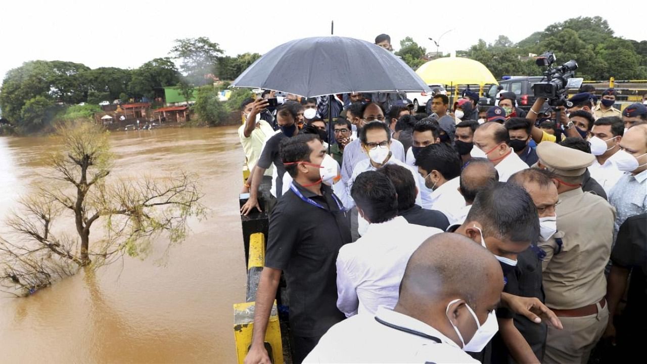 Maharashtra Chief Minister Uddhav Thackeray interacts with citizens, during a visit to flood-hit areas in Kolhapur, Friday, July 30, 2021. Credit: PTI Photo