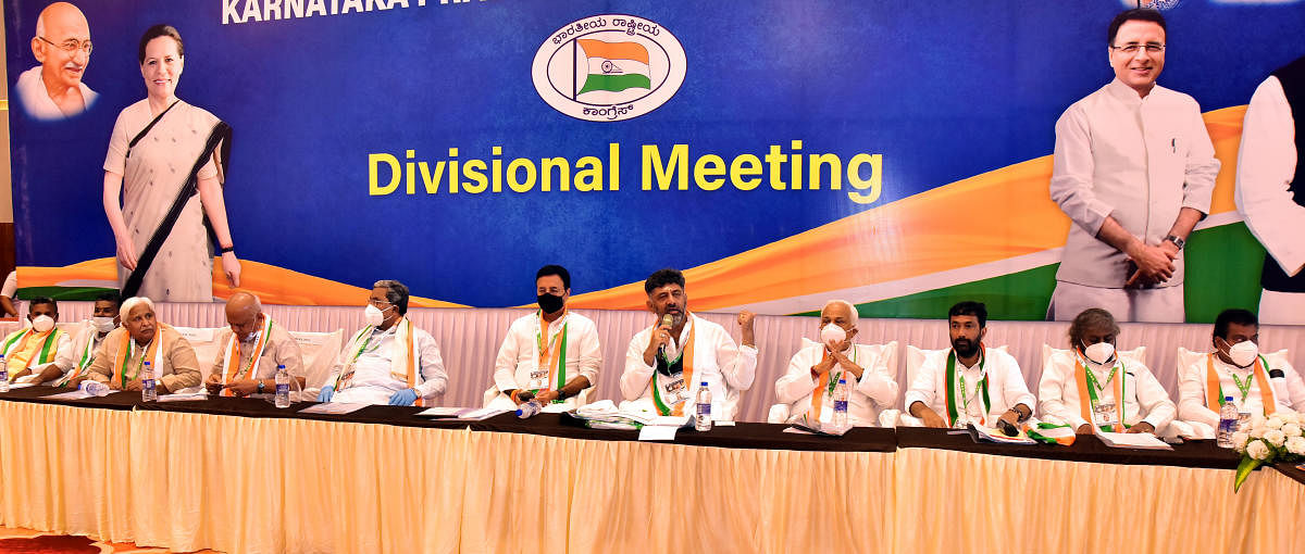 Karnataka Pradesh Congress Committee president D K Shivakumar speaks at the division-level meeting of party leaders in Hubballi on Friday. Credit: DH Photo/Govindaraj Javali