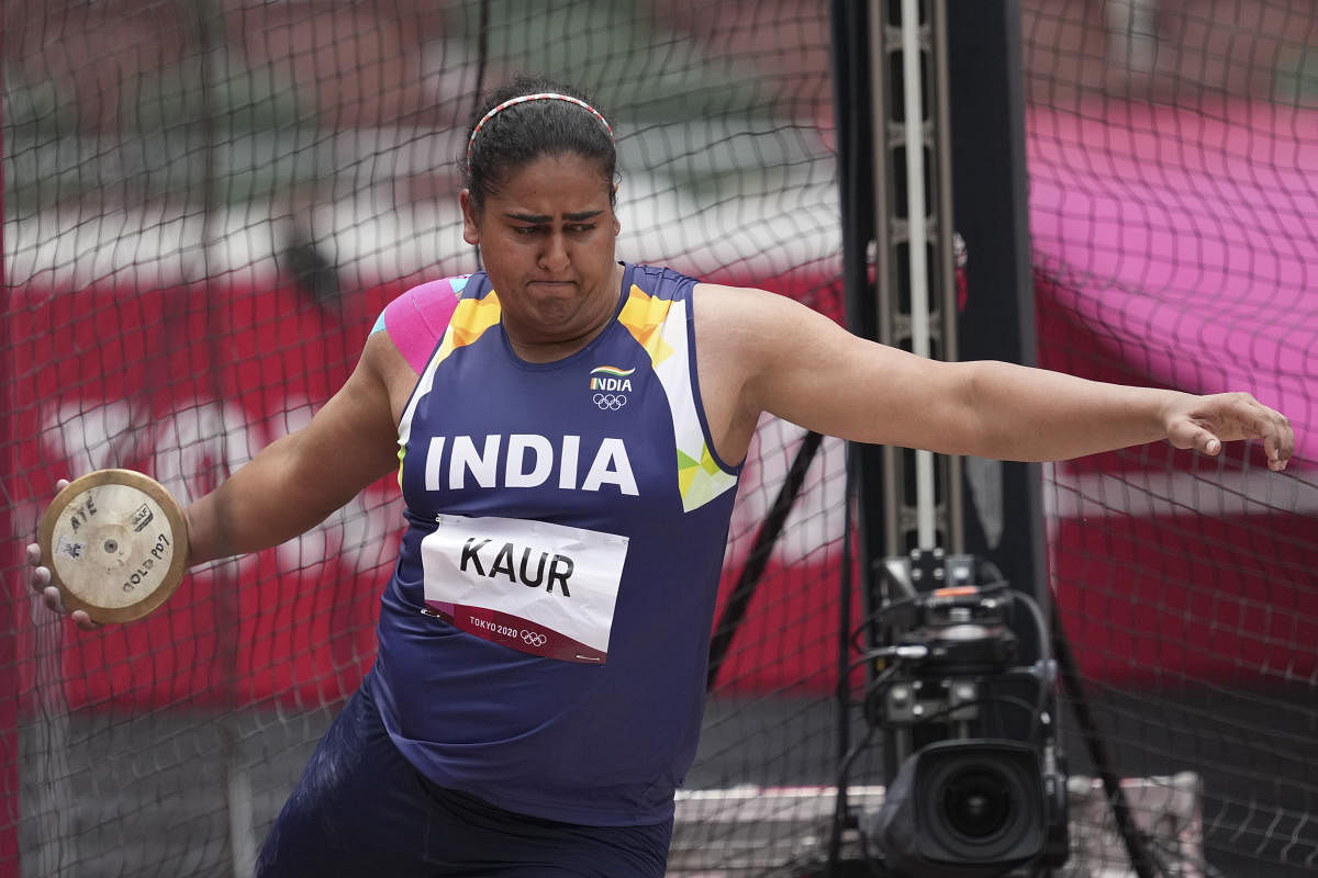 Kamalpreet Kaur, of India, competes during the qualification round of the women's discus throw at the 2020 Summer Olympics. Credit: Reuters Photo