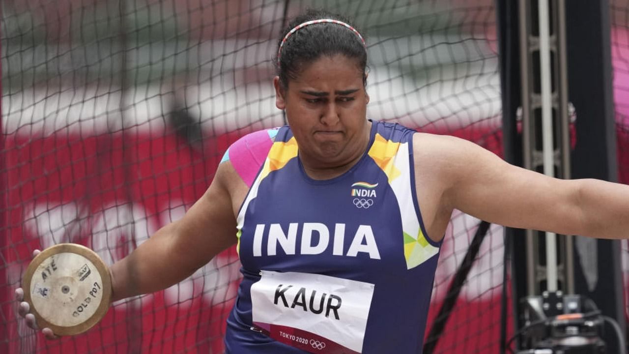 Kamalpreet Kaur, of India, competes during the qualification round of the women's discus throw at the 2020 Summer Olympics, Saturday, July 31, 2021, in Tokyo. Credit: PTI Photo