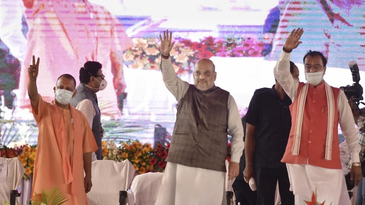 Union Home Minister Amit Shah, Uttar Pradesh Chief Minister Yogi Aditiyanath and Deputy CM K P Maurya during laying the foundation stone of the State Forensic Science Institute at Piparsand in Lucknow. Credit: PTI Photo