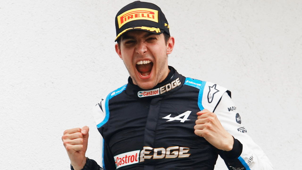 Esteban Ocon celebrates his Hungarian Grand Prix win. Credit: Reuters Photo