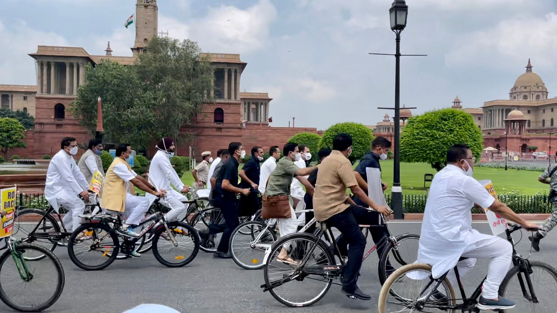 MPs including Gandhi took to cycling on Raisina Road  to oppose hike in prices of petrol, diesel and cooking gas cylinders. Credit: Twitter/@RahulGandhi