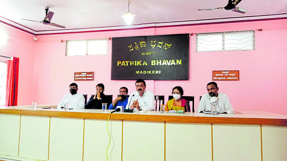 Congress Working President Dharmaja Uttappa speaks at a press conference in Madikeri on Monday.