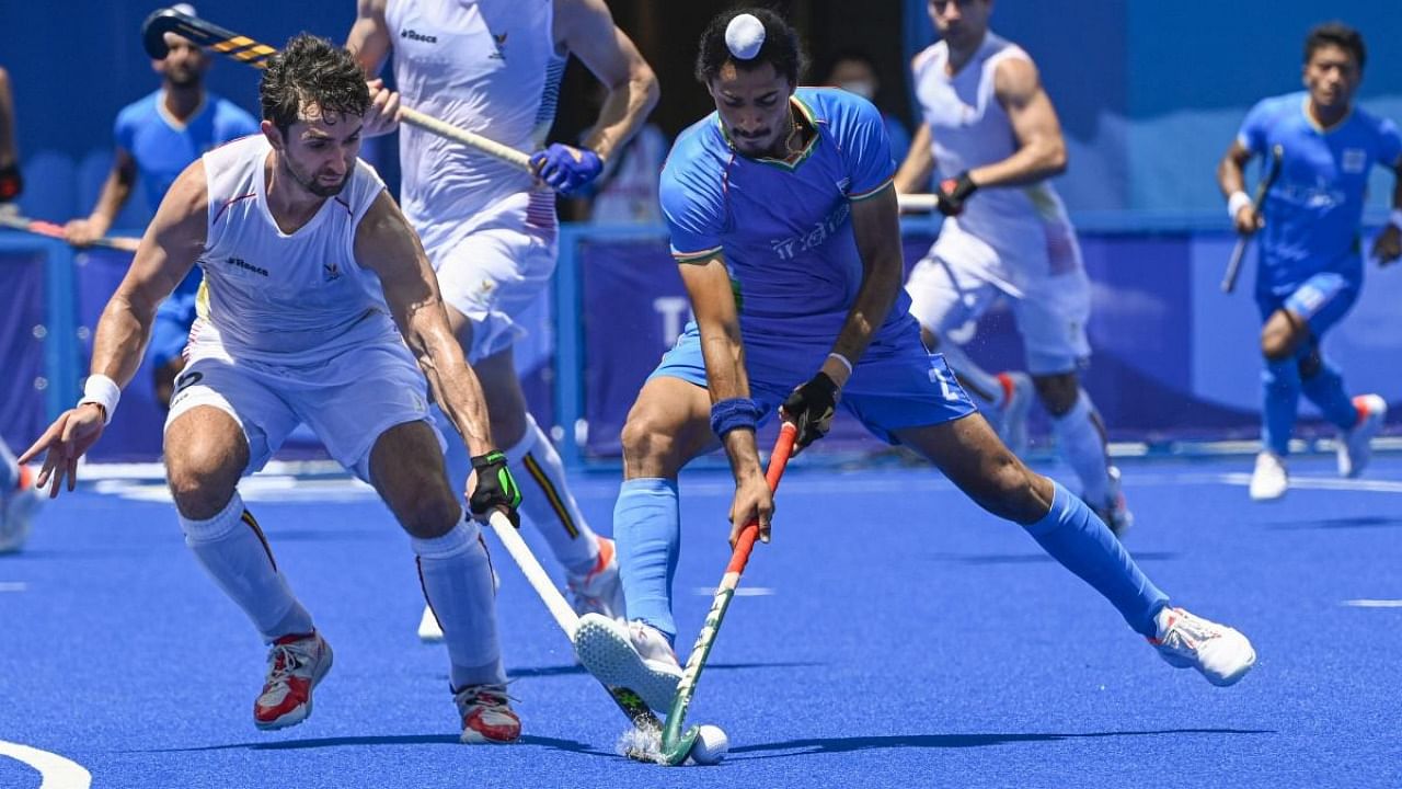 India's Hardik Singh in action against Belgium in the men's field hockey semifinal match, at the 2020 Summer Olympics, in Tokyo, Tuesday, Aug. 3, 2021. Credit: PTI Photo