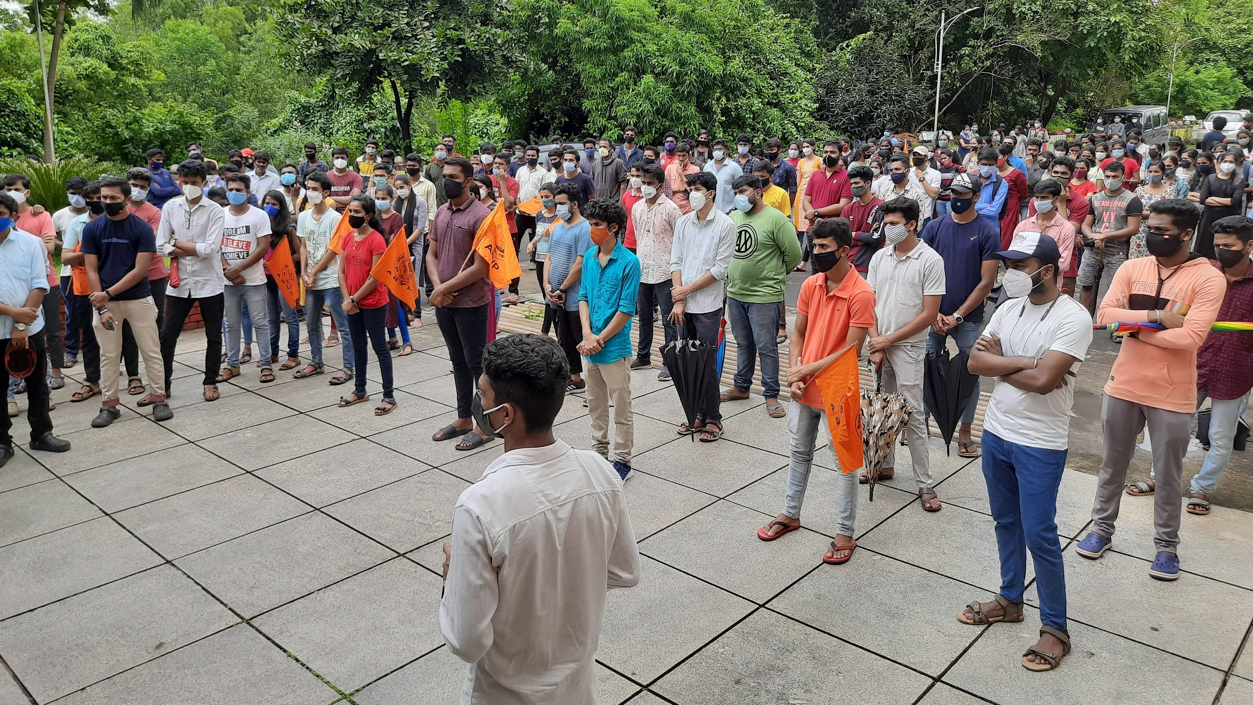 Students staged a protest outside the administrative building of Mangalore University at Mangalagangothri on Wednesday. Credit: DH photo