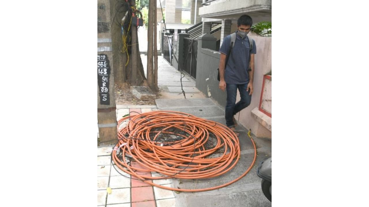 The petition stated that hanging/dangling electric/internet/TV cables pose a danger to the public. Credit: DH File Photo