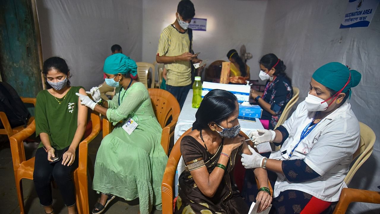 Women have received about 47% of the 48.1 core vaccine doses administered in India. Credit: PTI Photo