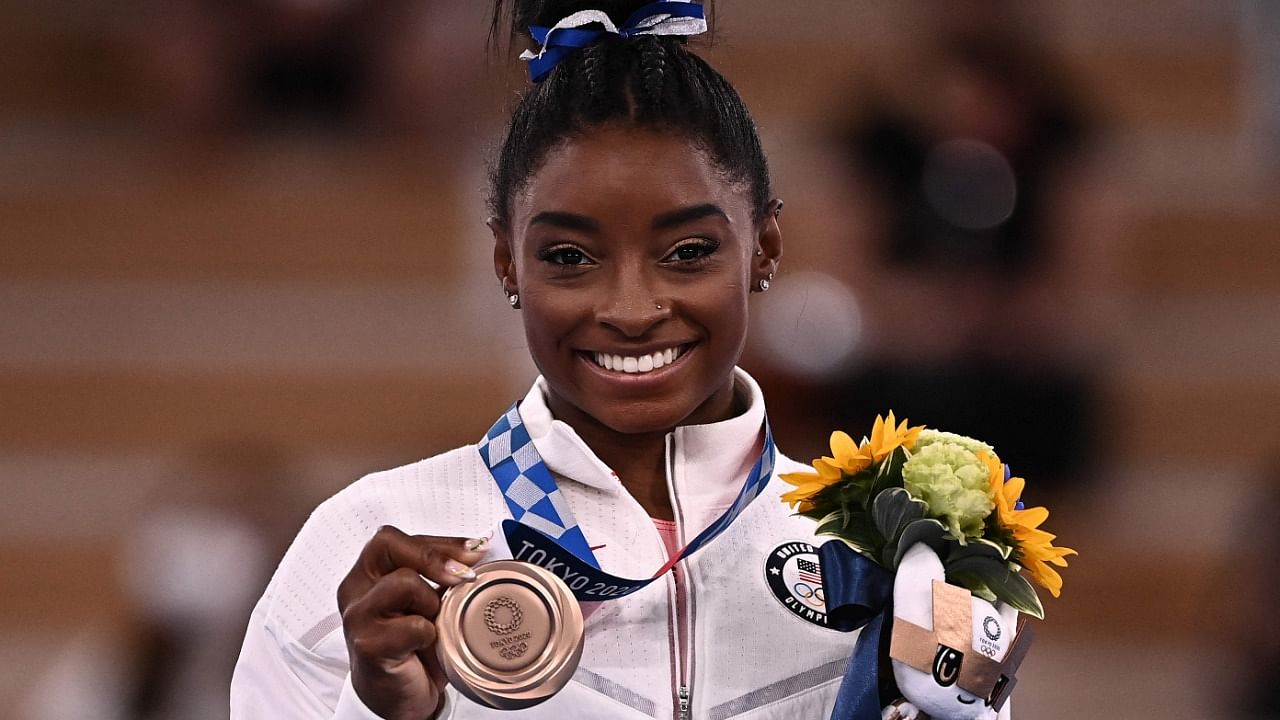 Henrietta Fore, executive director of UNICEF, thanked Biles (pictured) for being a role model. Credit; AFP Photo