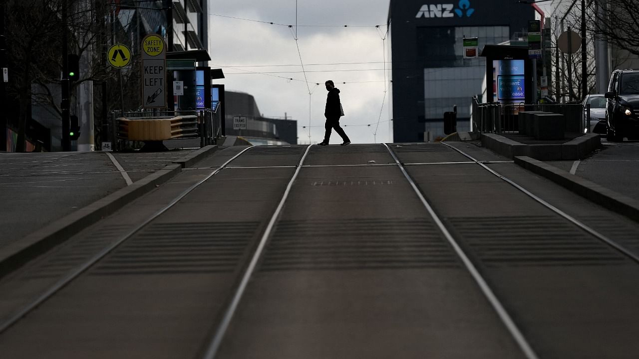 A man walks along a street in downtown Melbourne as authorities there announced a sixth lockdown for the city. Credit: AFP Photo