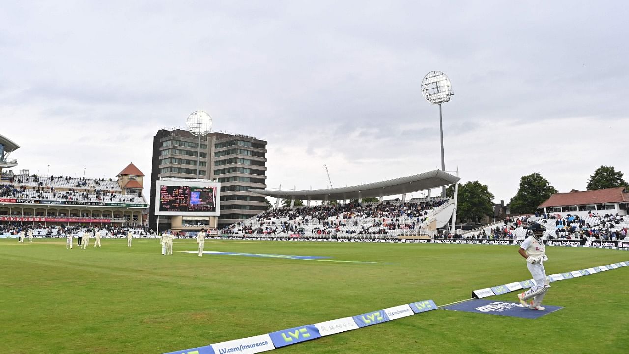 The players leave the field a second brief restart following delay in play for bad light and rain on the second day of the first cricket Test match of the India Tour of England 2021. Credit: AFP Photo