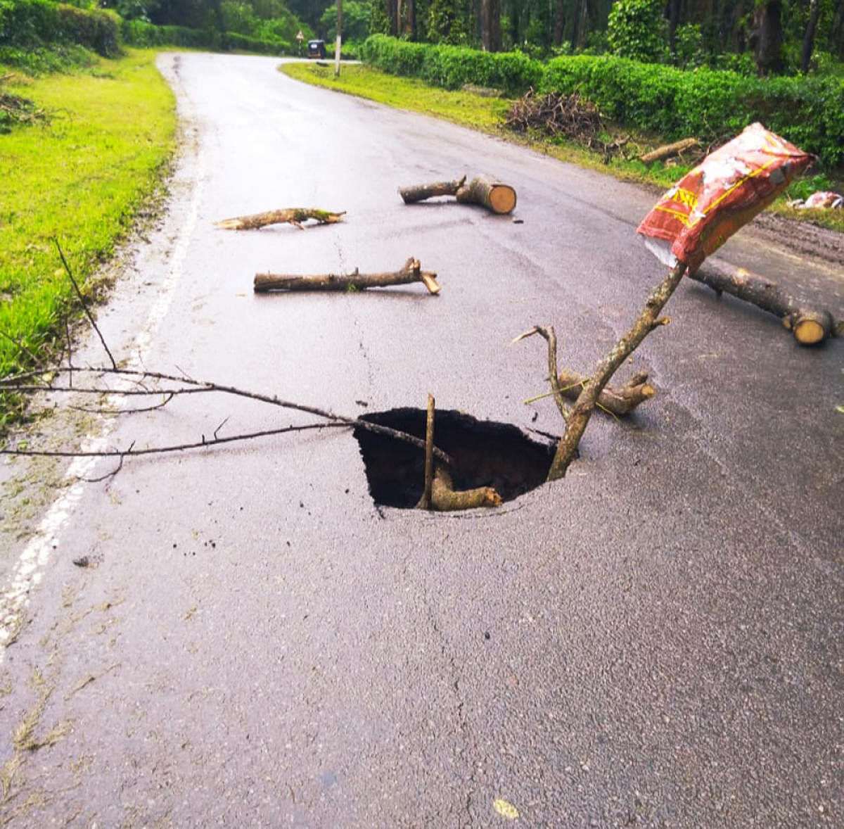 Part of a road on the Suntikoppa state highway caved in following heavy rain.