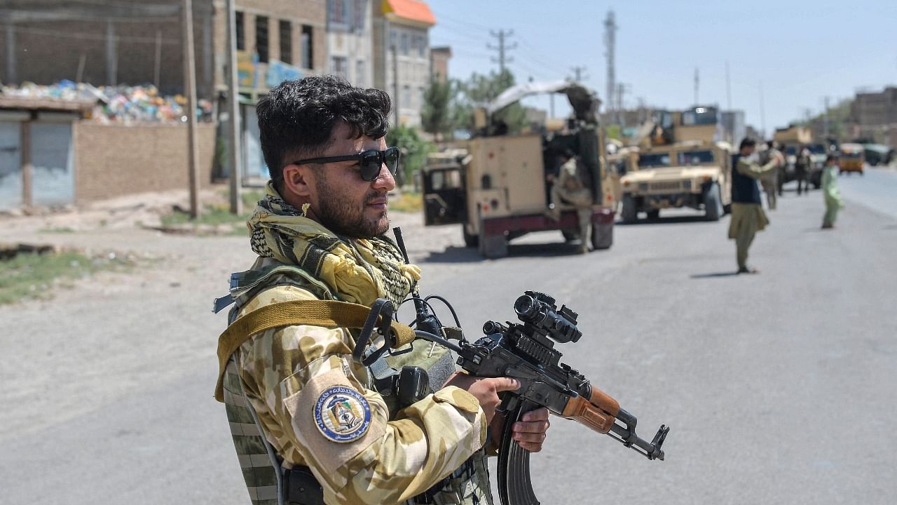 An Afghan National Army commando stands guard. Credit: AFP Photo