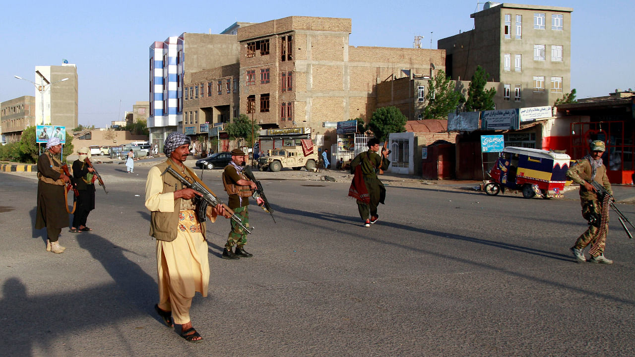 Private militia loyal to Ismail Khan, the former Mujahideen commander patrols after security forces took back control of parts of Herat city following fighting between Taliban and Afghan security forces in Herat province. Credit: AP Photo
