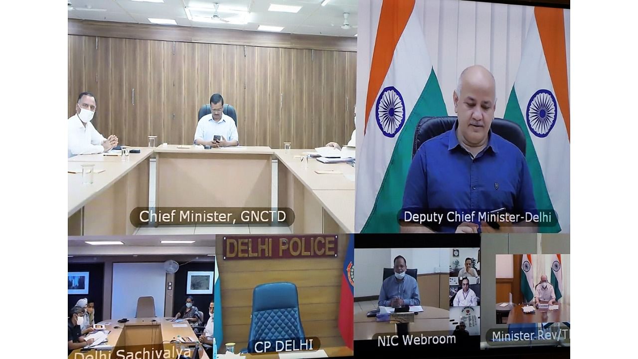 The meeting to review the Covid situation in the city was attended by Lt Governor Anil Baijal, Chief Minister Arvind Kejriwal, Deputy Chief Minister Manish Sisodia and others. Credit: Twitter/@LtGovDelhi