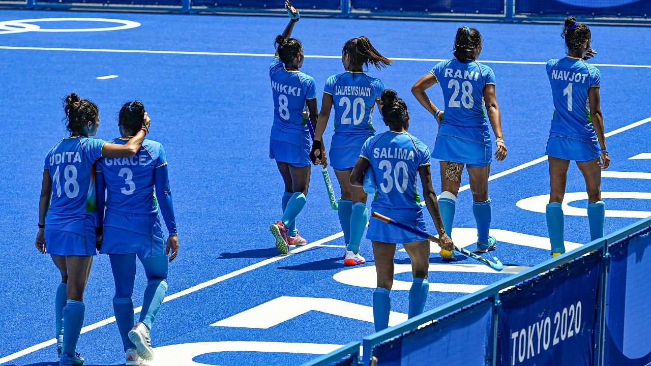 Indian players wave at supporters after their women's field hockey bronze medal match against Great Britain, at the 2020 Summer Olympics, in Tokyo. Credit: PTI Photo