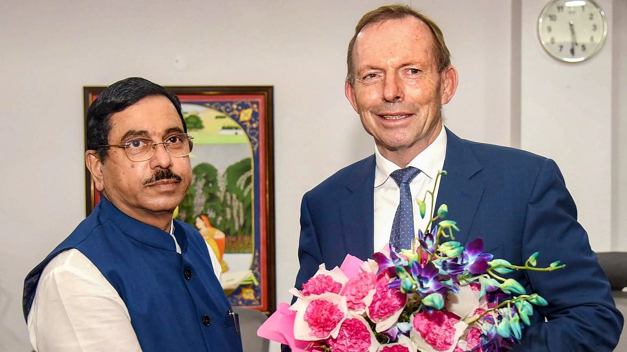 Union Minister for Parliamentary Affairs Coal and Mines Pralhad Joshi with former Australian prime minister Tony Abbott. Credit: PTI Photo