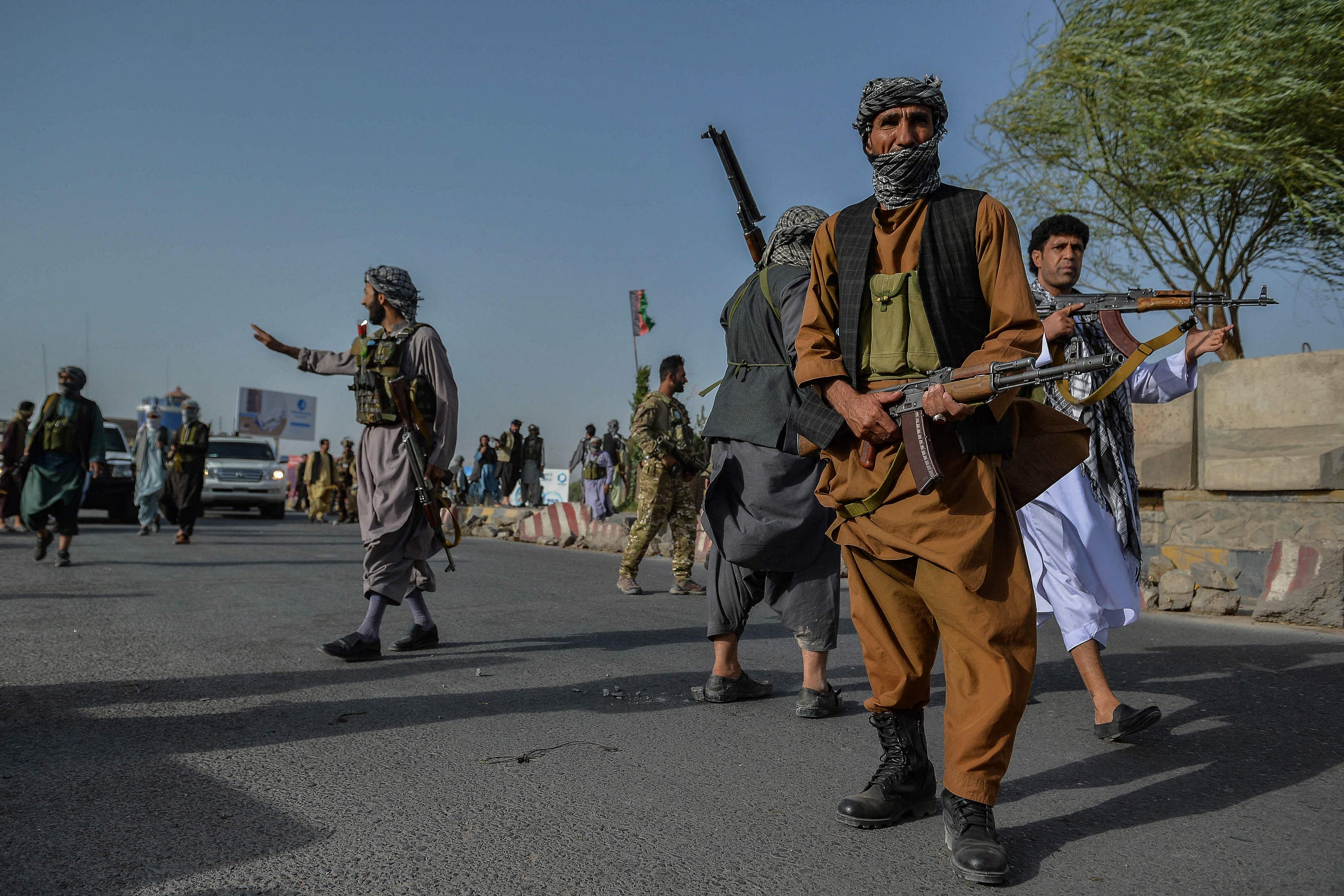 Afghan security personnel and Afghan militia fighting against Taliban. Credit: AFP Photo