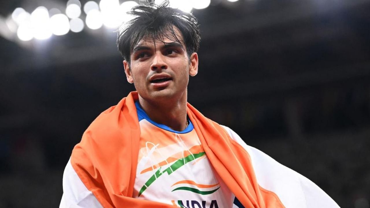 India's Neeraj Chopra celebrates after winning he men's javelin throw final during the Tokyo 2020 Olympic Games at the Olympic Stadium in Tokyo on August 7, 2021. Credit: AFP Photo