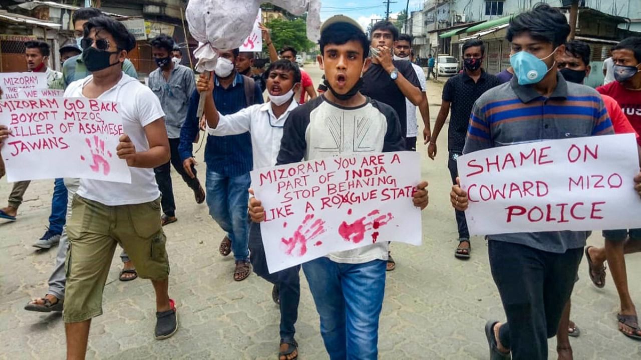 Locals carry an effigy of Mizoram Chief Minister Zoramthanga stage a protest in front of Mizoram House, against the killing of five Assam Police personnel and one civilian in Monday's Assam-Mizoram border clash, at Lailapur in Cachar district, Wednesday, July 28, 2021. Credit: PTI Photo