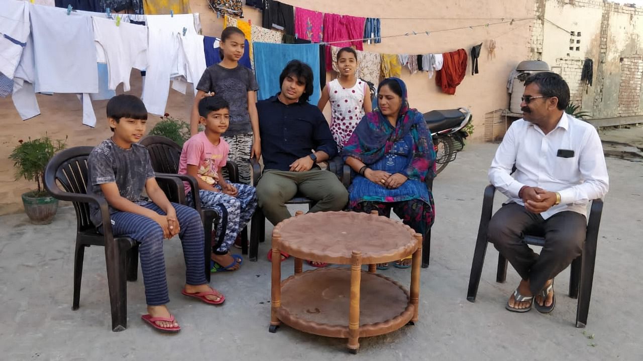 Neeraj Chopra with his family in Khandra. Credit: Special Arrangement